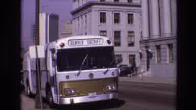 Denver Colorado USA (1974): Bus In A Crowded Parking Lot With Lots Of Cars