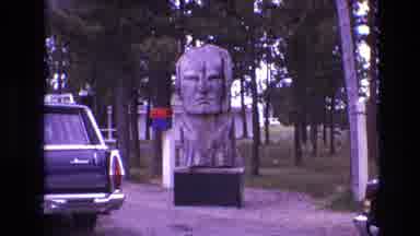 South Dakota USA (1974): Large Statue In A Park Full Of Cars And People