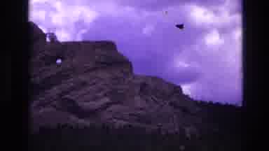 South Dakota USA (1974): Rocky Outcropping Above A Forest Of Trees