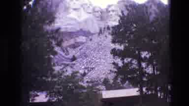 South Dakota USA (1974): Men With Camera Clip Of Mount Rushmore