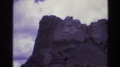 South Dakota USA (1974): Mount Rushmore Cast In Shadows On A Cloudy Day
