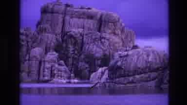 South Dakota USA (1974): Large Rock Formation Surrounded By Water