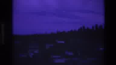 South Dakota USA (1974): Houses On A Wooded Hill During The Early Evening