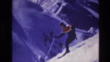 Vail Colorado USA (1974): Image Of A Person Skiing Down A Snowy Mountain