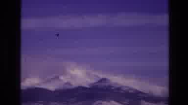 Vail Colorado USA (1974): Purple Skies Compliment A Snowy Mountain Peak
