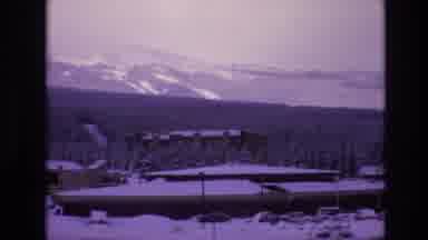 Vail Colorado USA (1974): Snowing Mountain Top Over The Wooded Area Close To The