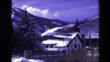 Vail Colorado USA (1974): Home Near Snowy Mountains And Busy Street