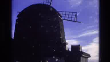 Vail Colorado USA (1974): Windmill With Cars In The Front And Blue Sky In The