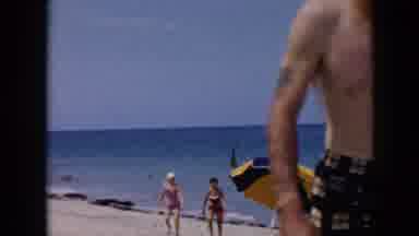 Cuba (1956): People Wandering Barefoot In The Sunny Sandy Beach