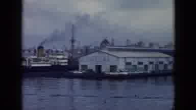 Cuba (1956): A Fisherman's Wharf With Industrial Factories In The Distance On A