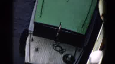 Cuba (1956): White Boat With Green Roof Taking Off From Jetty