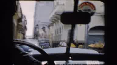 Cuba (1956): Person Driving Through Town