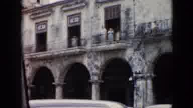 Cuba (1956): Ship Taking Off To The Ocean And An Old Building With Parked Cars In