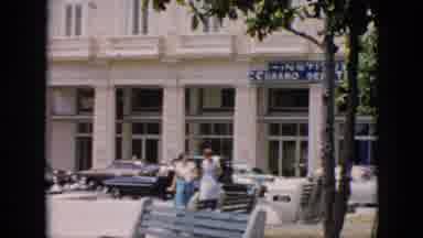 Cuba (1956): Only Describe The People Place And Action In The Video Using Relevant