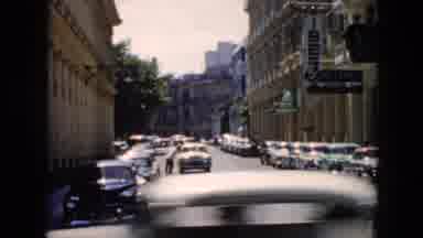Cuba (1956): Man Talks To Person In Car That Has Stopped In The Middle Of The Road