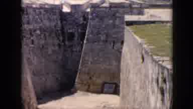 Cuba (1956): Women Seen Looking At Old Fort Walls On A Sunny Day