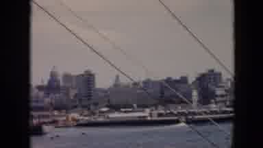 Cuba (1956): Overlooking A Body Of Water With Massive Ships Pulling Into Ports