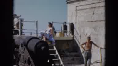 Cuba (1956): Beautiful Woman Walking With A Male Dressed In White With A Black Tie