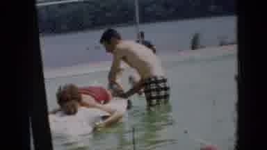 Cuba (1956): Two People Having Fun With Their Float In A Swimming Pool