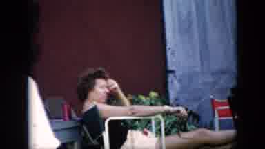 Cuba (1956): Two Women Lounging Outside In The Backyard