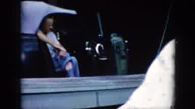 Cuba (1956): An Old Woman Sitting A Younger Man And Another Man Waving