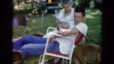 Cuba (1956): People Relaxing With Their Dogs On A Shady Part Of The Backyard