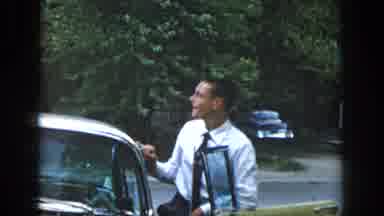 Dayton Ohio USA (1958): Man Getting Into A Vintage Car