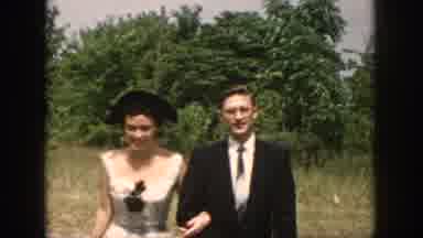 Dayton Ohio USA (1958): Well-Dressed Man And Woman Walking Toward The Camera