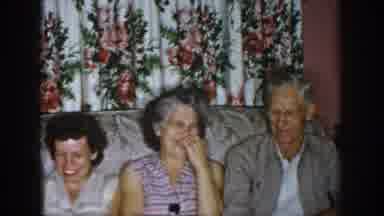 Dayton Ohio USA (1958): Four People Laughing While Sitting On A Couch
