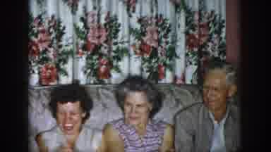 Dayton Ohio USA (1958): Group Of Two Men And Two Women Sitting On Couch Smiling