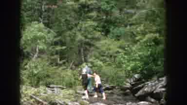 Dayton Ohio USA (1958): Group Of Three People Hiking In A Mountainous Forest Area