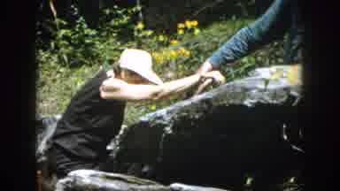 Dayton Ohio USA (1958): A Woman Getting A Little Help Up A Rocky Ledge