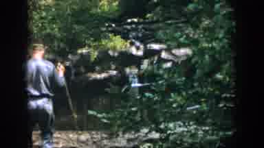 Dayton Ohio USA (1958): Uniformed Man Walking Around Pond With Surrounding