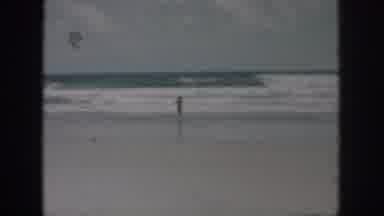 New Orleans Louisiana USA (1958): Person At Beach Walking Towards Waves