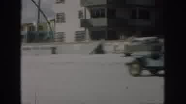 New Orleans Louisiana USA (1958): Car Driving By With A View Of A Ferris Wheel And