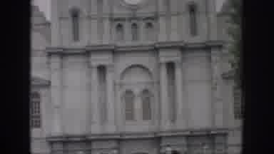 New Orleans Louisiana USA (1958): Mysterious Grey Building With Clock Ticking Away