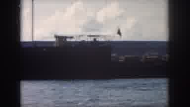 New Orleans Louisiana USA (1958): Boat Near Shore Fleeing From Larger Boat That