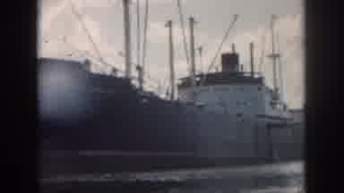 New Orleans Louisiana USA (1958): A Speedboat Passes A Transport Ship At Anchor In