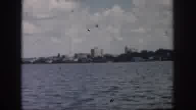 New Orleans Louisiana USA (1958): Speed Boat Gradually Nears Small City