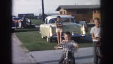 New Orleans Louisiana USA (1958): Man And Children In The Driveway Of Their Home