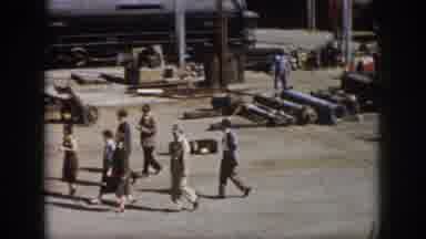 Virginia USA (1958): People Walking Through Railroad Yard Observing Workers And