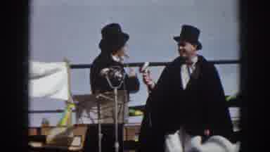 Virginia USA (1958): Windy Day With Two Men On The Stage And One Playing The