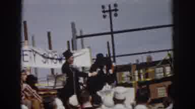 Virginia USA (1958): Two Men In Capes And Hats Perform To A Crowd At A Variety