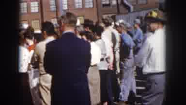 Virginia USA (1958): A Crowd Of Men And Women Gather In Front Of An Industrial