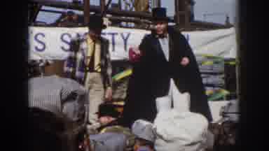 Virginia USA (1958): A Man Looking On In Glee As A Magician And His Assistant Play