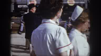 Virginia USA (1958): People Dressed In Uniforms And Costumes Gather On A Concrete