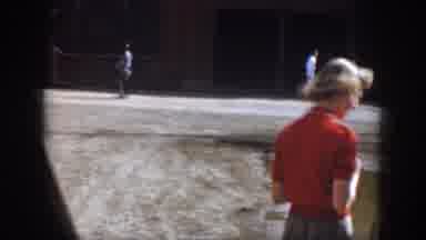 Virginia USA (1958): People Dressed In Costume Mill Around A Dirt Parking Lot In