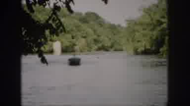 Virginia USA (1958): Man In Speedboat Passes By