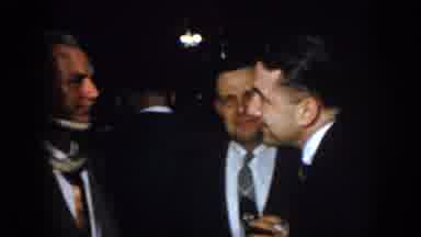 Virginia USA (1958): Several Men Having A Conversation In A Darkened Room At A