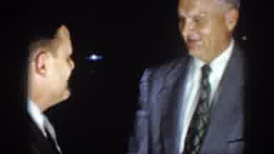 Virginia USA (1958): Two Men Shaking Hands While Having A Short Conversation